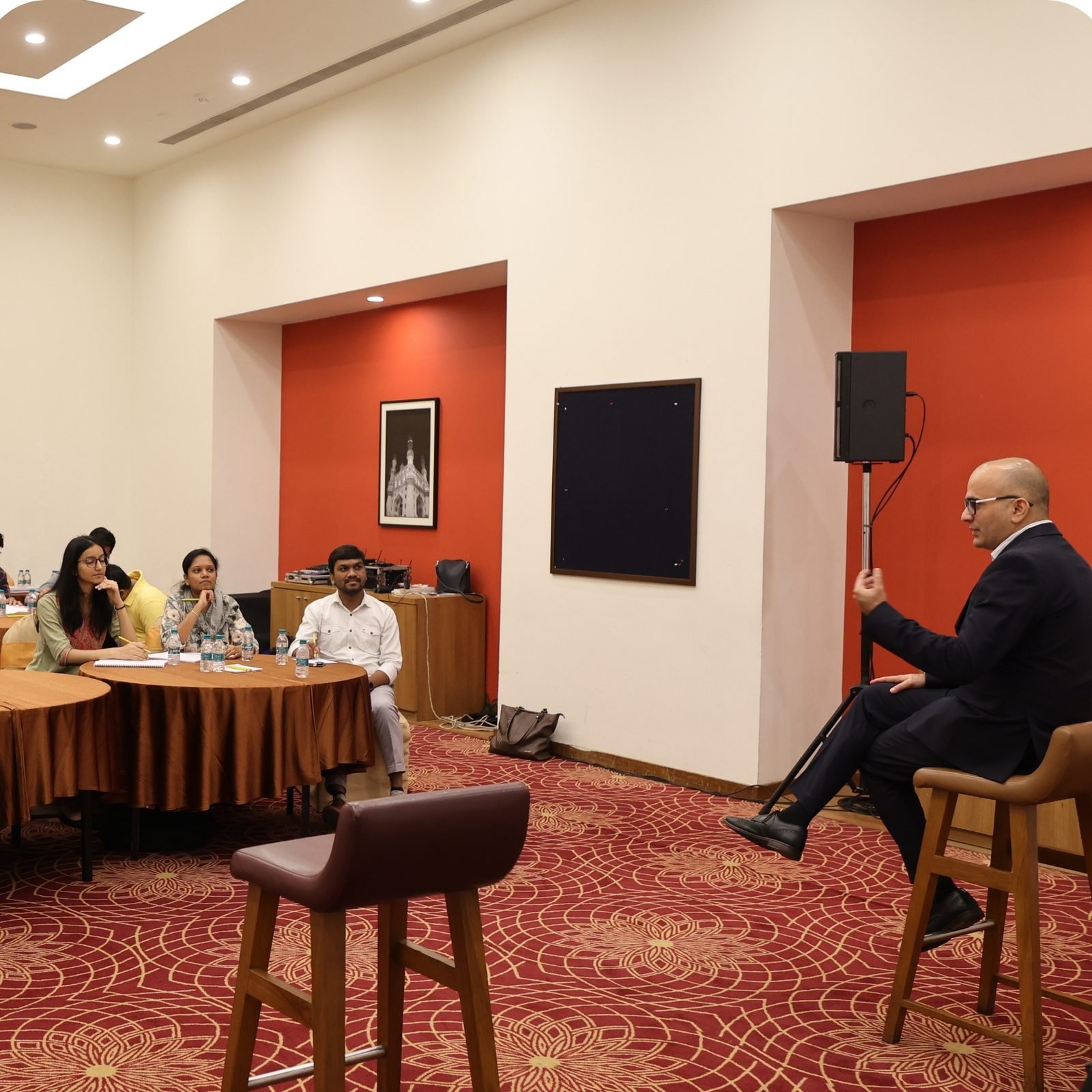 A fintech leadership room, Hyderabad, 2023.